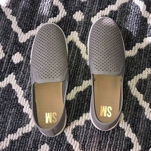 Gray slip ons
